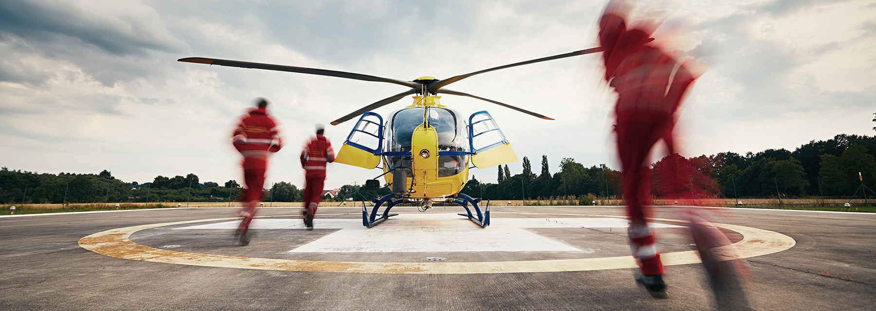 emergency workers heading to helicopter
